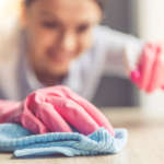 Housekeeper cleaning a home