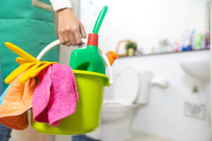 house keeper in bathroom