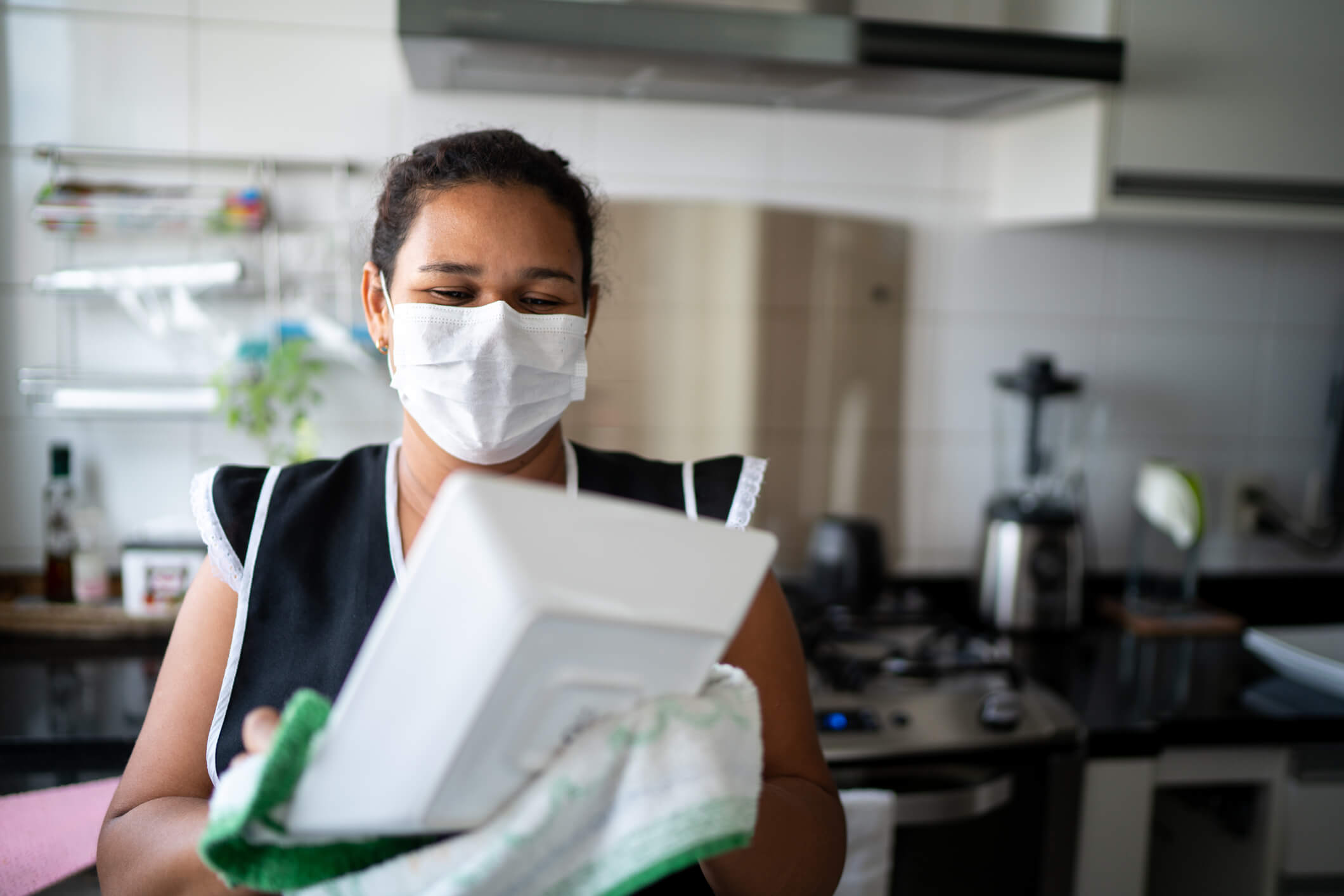 temporary housekeeper in kitchen