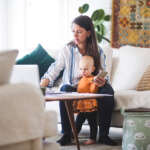 nanny on the computer with child