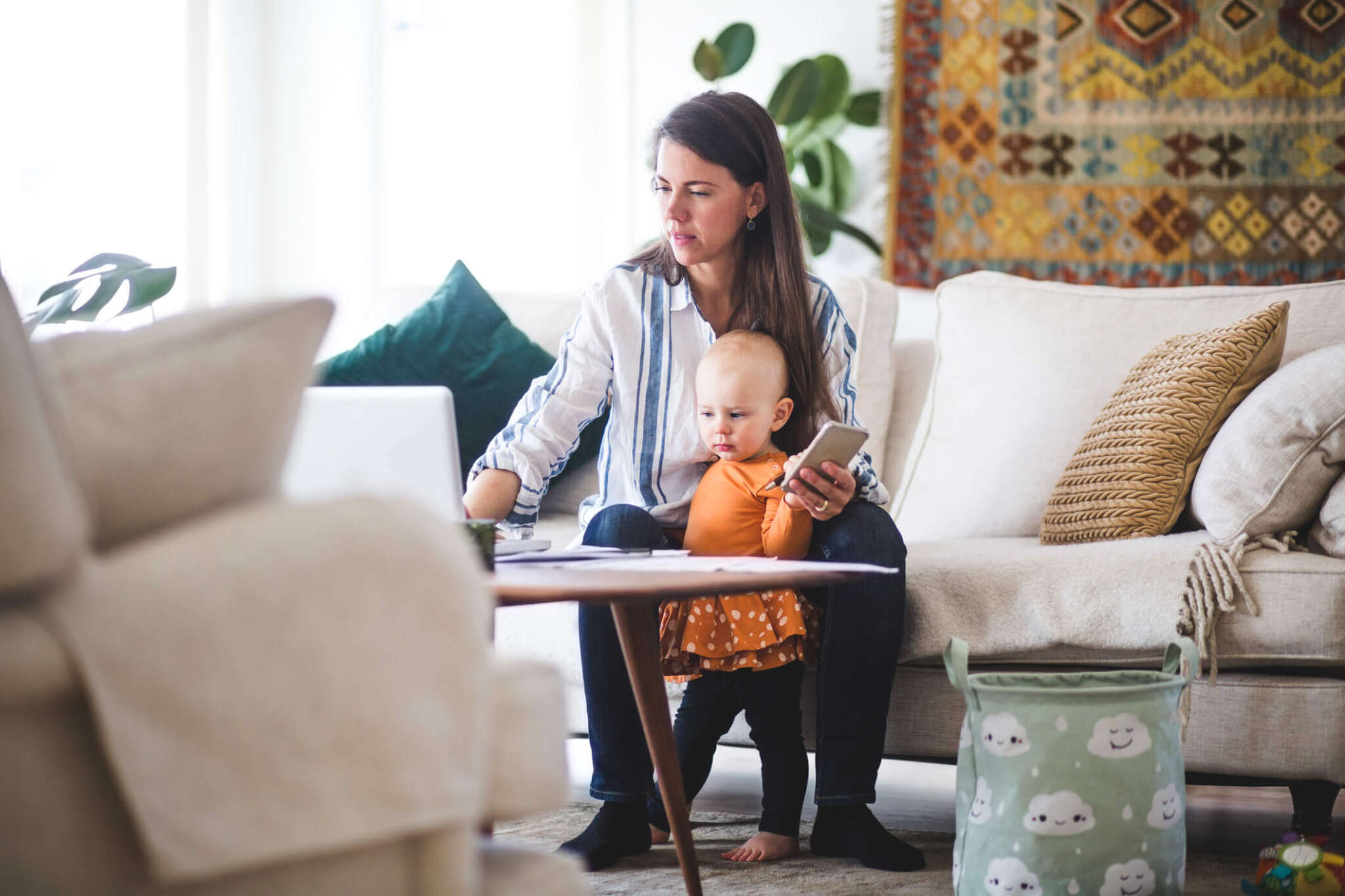 nanny on the computer with child